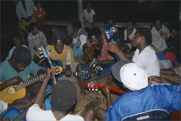 20061593. PACIFIC ISLANDS Vanuatu Tanna. Musicians playing guitars at John Frumm service