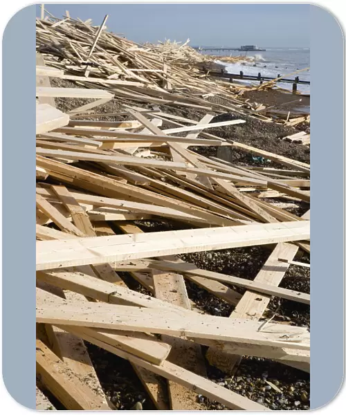 20089251. ENGLAND West Sussex Worthing Timber wood planks washed up on the beach seafront