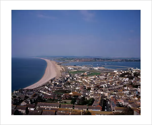 ENGLAND, Dorset, Portland Elevated view over Chesil Beach from cliff path above town