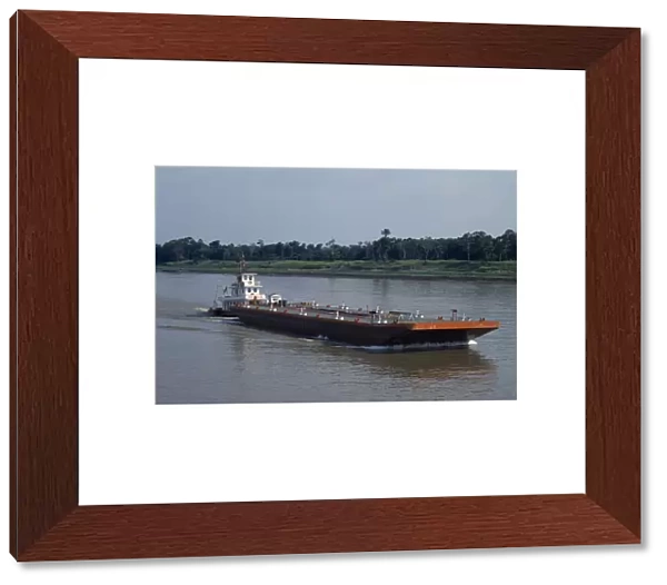 20071536. BRAZIL Amazon Barge on the Amazon River being pushed upstream towards Manaus