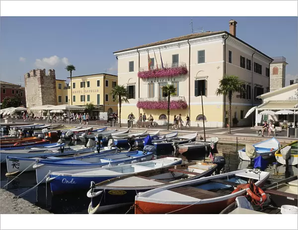 Italy, Veneto, Lake Garda, Bardolino, harbour front with fishing boats