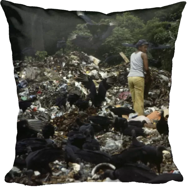ECUADOR, Guayas Province, Guayaquil The city rubbish tip with a woman searching for
