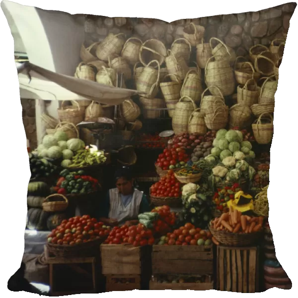 BOLIVIA, Sucre Market stall selling fruit, vegetables and locally made baskets