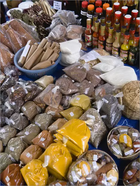 20090534. West Indies St Lucia Castries Market stall with packets of locally