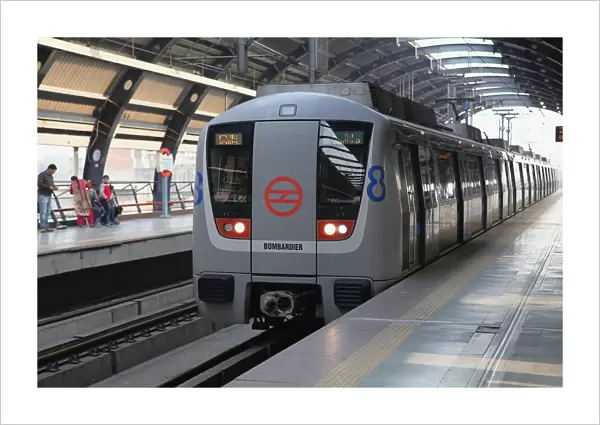 India, New Delhi, Metro train at Ramakrishna Ashram Marg metro station