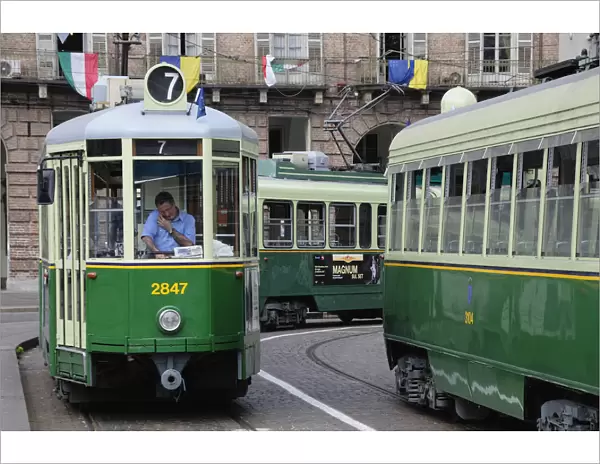 Italy, Piedmont, Turin, trams on Piazza Castello