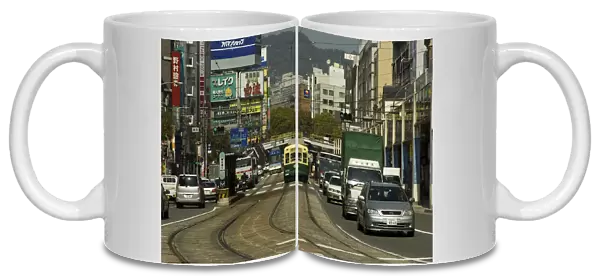 20083170. JAPAN Kyushu Nagasaki Kanko dori - cars tram
