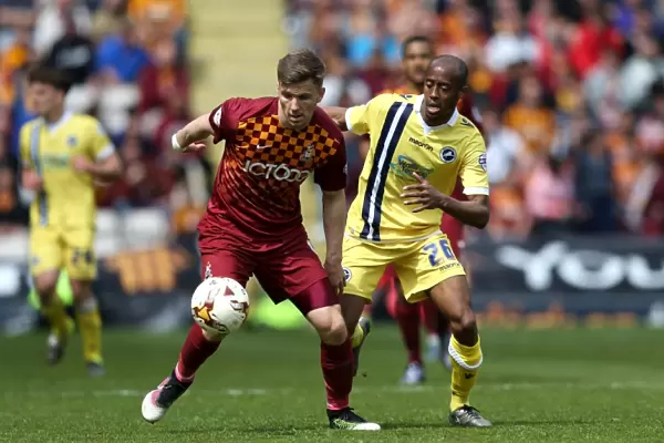 Intense Rivalry: Evans vs Abdou Battle for League One Play-Off Supremacy