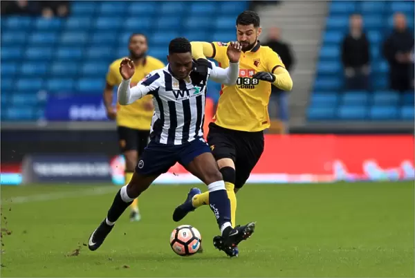 Millwall vs Watford in Emirates FA Cup: Onyedinma and Britos Clash for Ball at The Den
