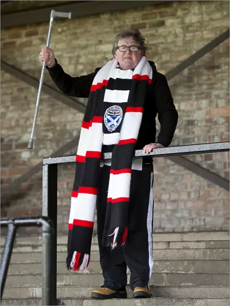 Passionate Ayr United Fan with Scarf and Walking Stick at Somerset Park Before Rangers Scottish Cup Match