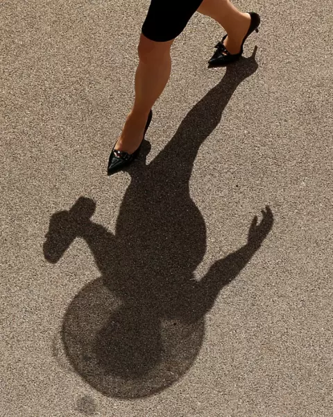 The shadow of a racegoer before the races - Horse Racing