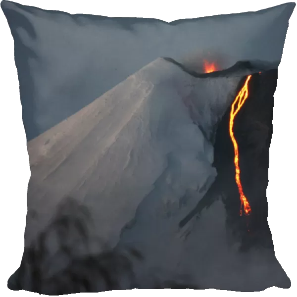 The Llaima volcano spews lava in Cherquenco town