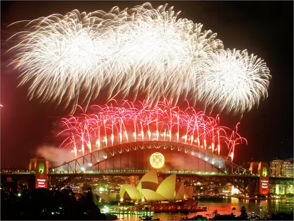 Fireworks explode over the Sydney Harbour Bridge and Opera House