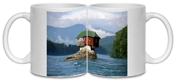 A house built on a rock on the river Drina is seen near the western Serbian town of