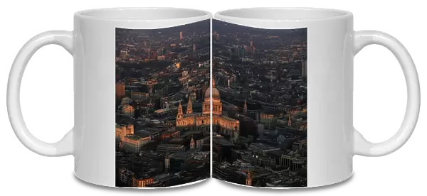 St Pauls cathedral is lit by the early morning sun in an aerial view taken from The