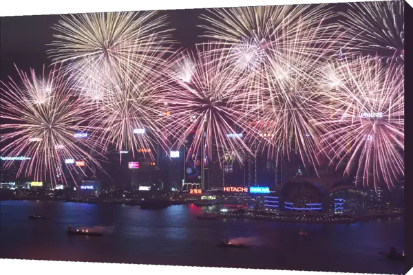 Fireworks explode over Victoria Harbour to celebrate the Lunar New Year in Hong Kong