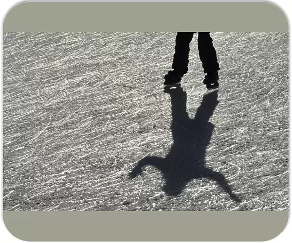A visitor skates on the ice rink at Tower of London