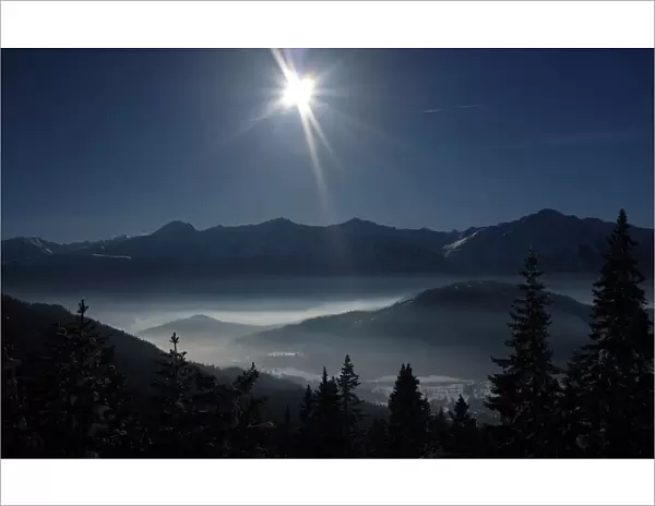 Ground fog lies down in Inntal valley during the first sunny day in 2015 in the Austrian