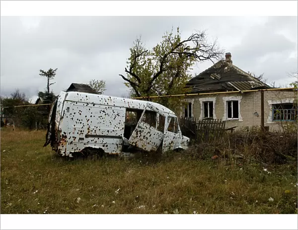 The Wider Image: War-scarred neighbourhoods in rebel-held Donetsk