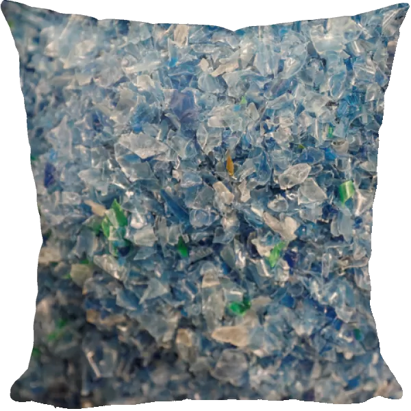 Chips made from recycled plastic bottles are seen before being processed at the Weeco