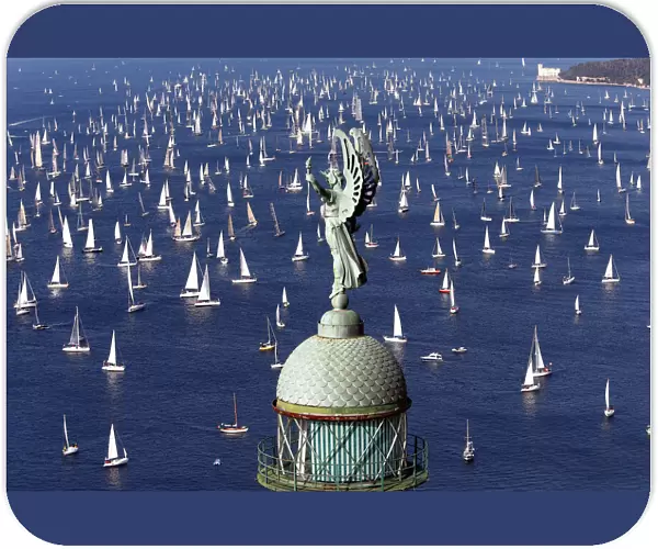 Sailing boats gather at the start of the Barcolana regatta in front of Trieste harbour