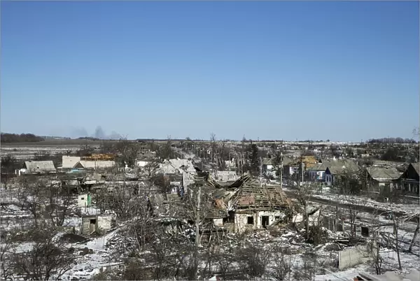 Buildings damaged by fighting are pictured in the village of Nikishine