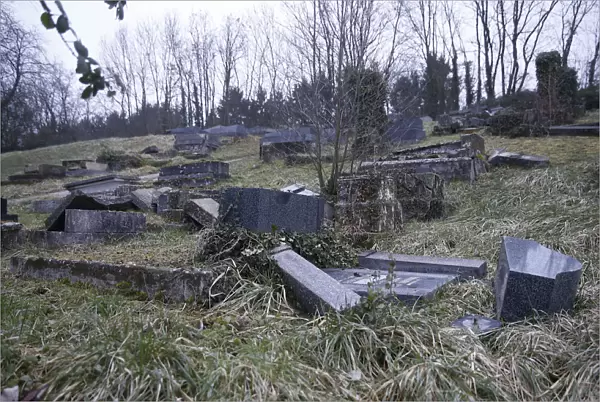Desecrated tombstones are seen at the Sarre-Union Jewish cemetery, eastern France