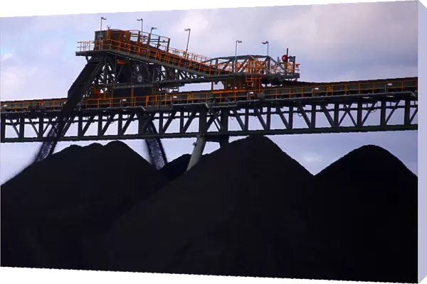 Coal is unloaded onto large piles at the Ulan Coal mines near the central New South Wales