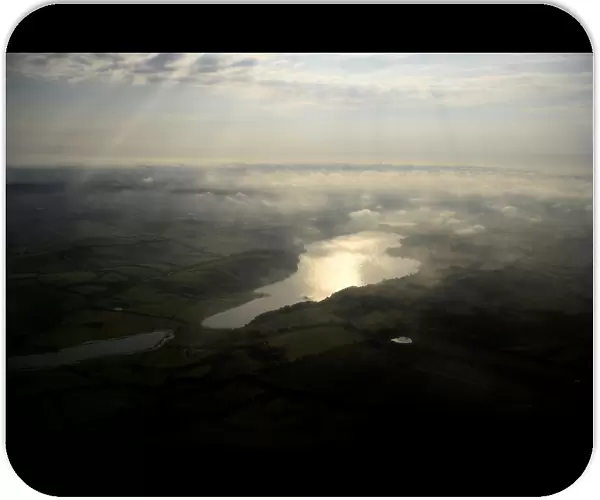Aerial view of sun rays at dawn above Dublin