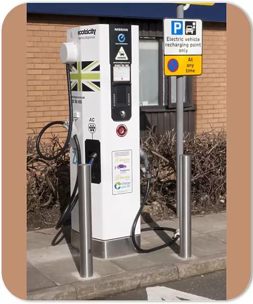 Recharging point for electric cars at motorway service area, England, April