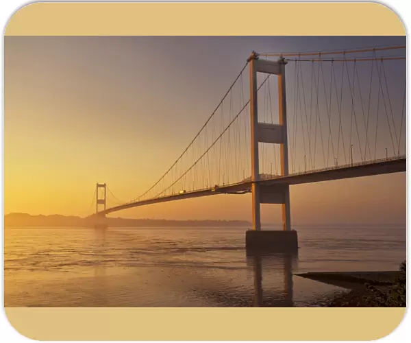 View of suspension bridge at dawn, viewed from Beachley looking towards Monmouthshire Severn Bridge, River Severn