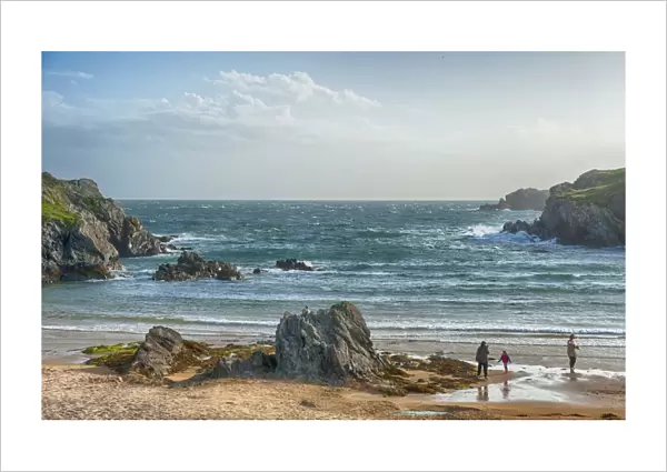 View of rocky beach and choppy sea, Porth Dafarch, Holyhead, Holy Island, Anglesey, Wales, August
