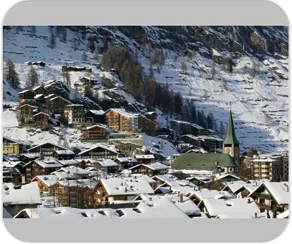 SWITZERLAND-Wallis  /  Valais-ZERMATT: Town View & Parish Church from the West  /  Winter