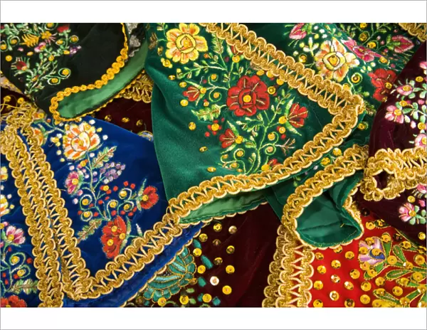 Embroidered skirst on display at market, Cuenca, Ecuador, South America