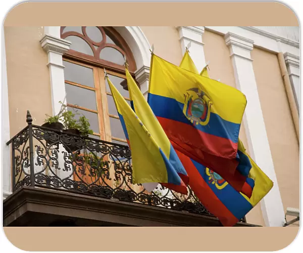 South America, Ecuador, Pichincha province, Quito. National flags of Ecuador hang
