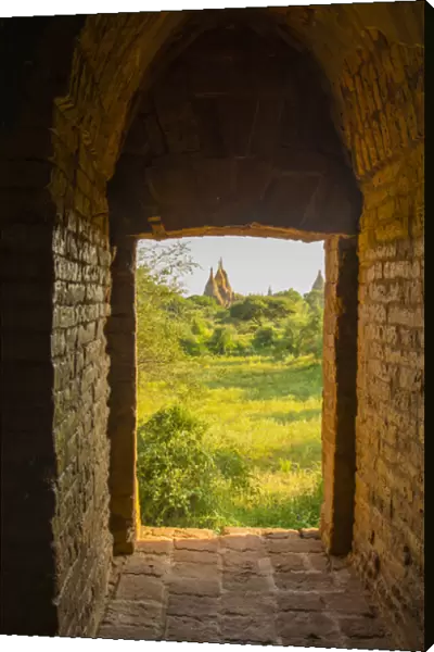 Myanmar. Bagan. View of some pagodas from inside a temple