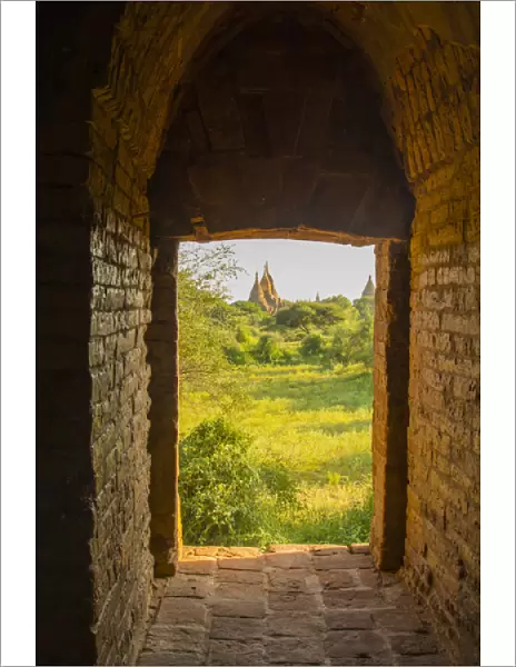 Myanmar. Bagan. View of some pagodas from inside a temple