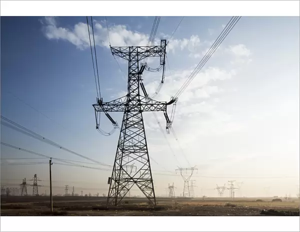 China, Shanxi Province, Datong, High Tension Power Pylons and electrical lines leading
