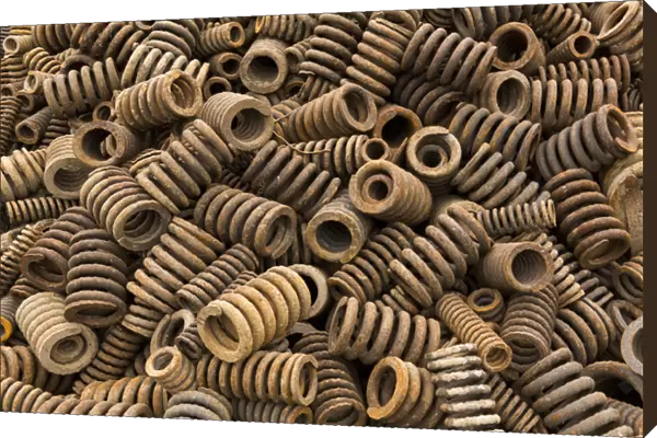 China, Chongqing, Detail of heavy iron springs recycled from trucks and machinery