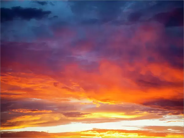 Colorful sunset blossoms across a New Mexico sky