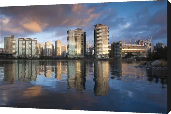 Canada, British Columbia, Vancouver, buildings along False Creek, dawn