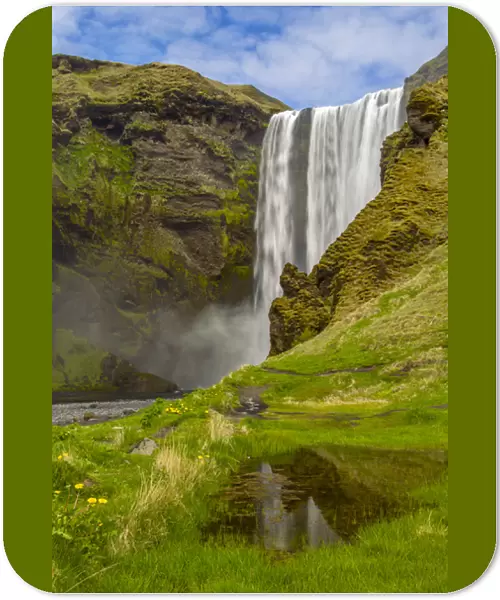 Europe, Iceland, Skogafoss. Waterfall reflects in pool