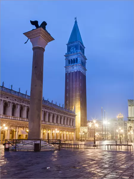 Venezian Lion Statue and the Campanile early Morning. Venice. Italy