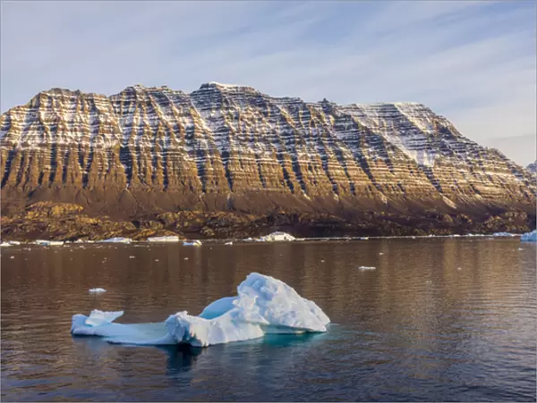 Greenland. Scoresby Sund. Icebergs and deeply eroded mountains