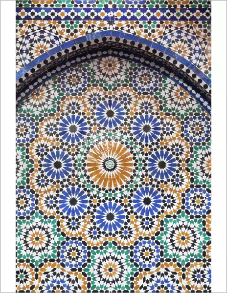 Africa, Morocco, Fes. A detail of a mosaic tiled fountain