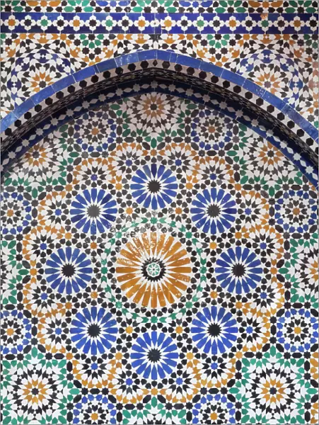 Africa, Morocco, Fes. A detail of a mosaic tiled fountain