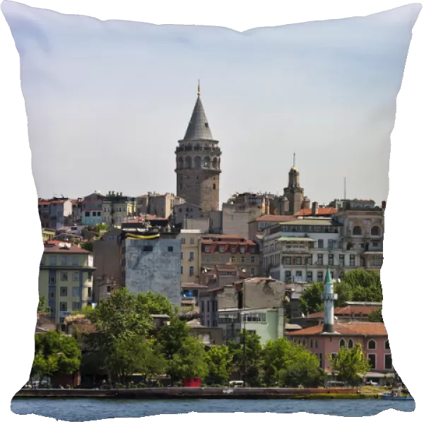 Galata Tower and houses along the waterfront. Golden Horn, Istanbul, Turkey