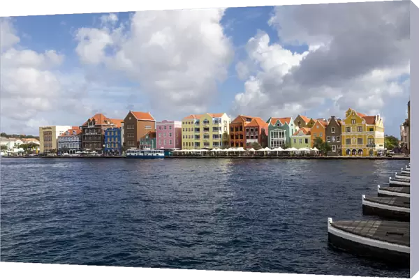 Lesser Antilles, Curacao, Willemstad. Colorful shopping district along the water