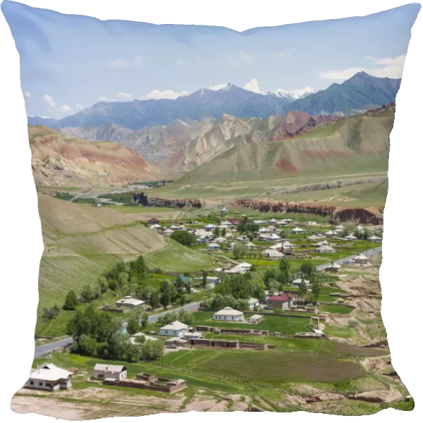 Village at the Pamir Highway. The mountain range Tian Shan or Heavenly Mountains
