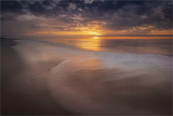 USA, New Jersey, Cape May National Seashore. Sunrise on ocean shore